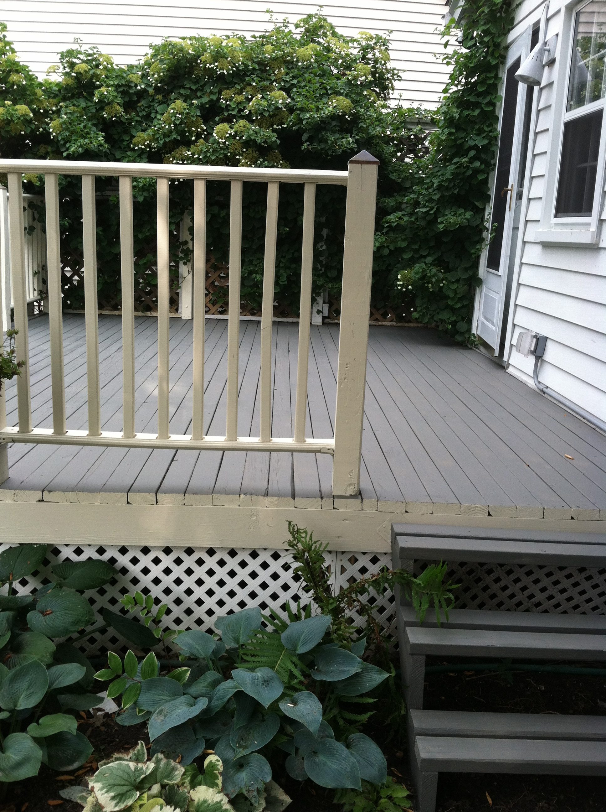 After: Bay Village Wooden Deck - Pressure Washing & Painting