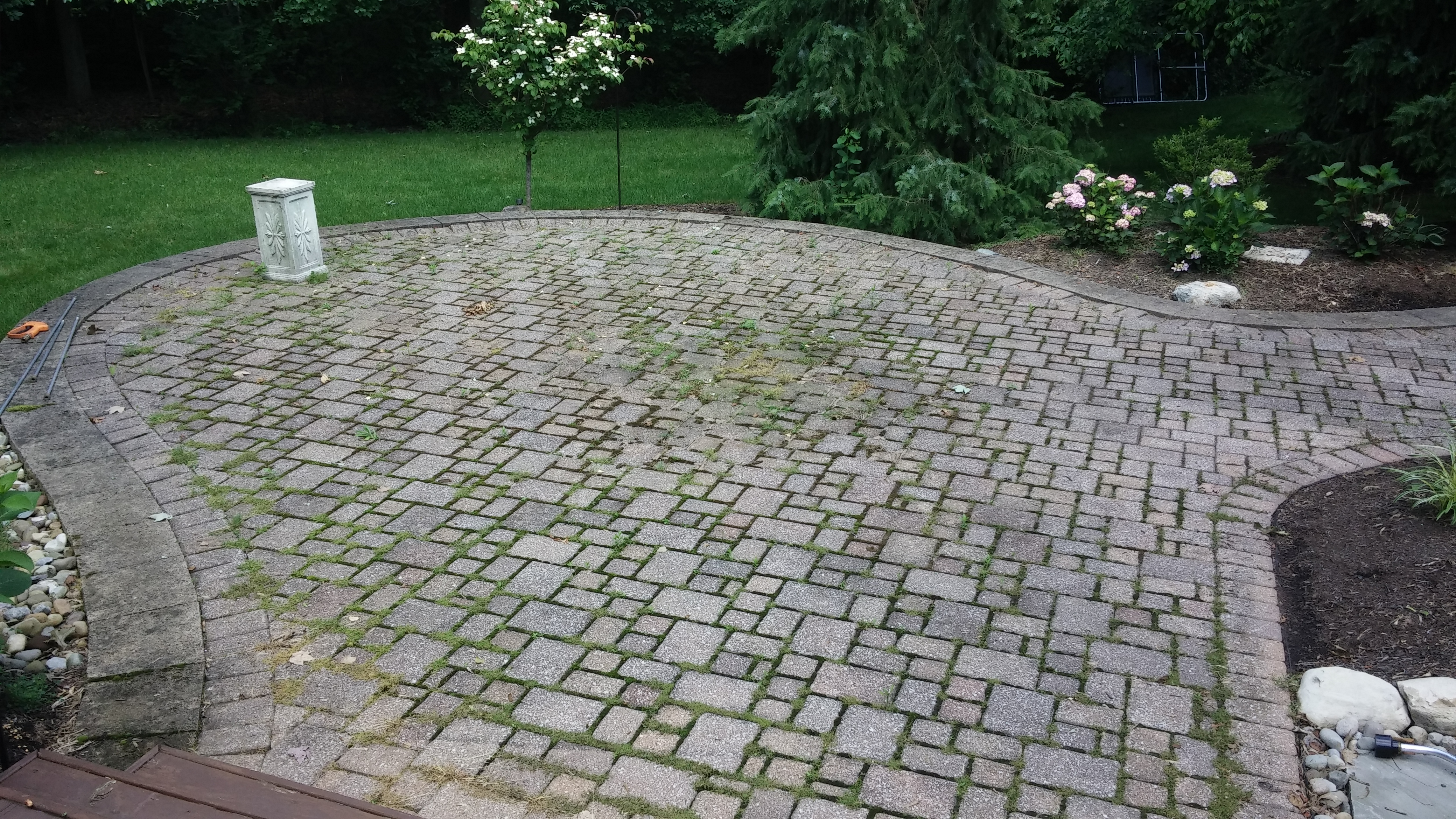  Before - Rear Brick Paver Patio in N. Olmsted Pressure Washing