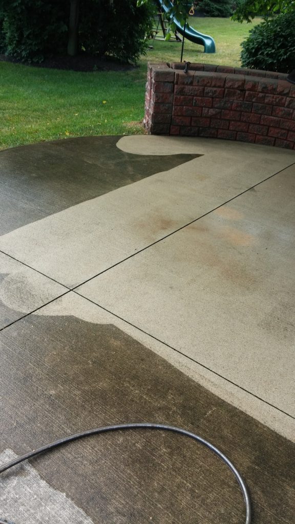 During - Avon Lake Rear Patio Partially Pressure Washed  